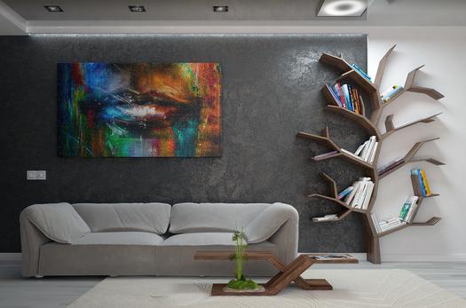 Modern living room with colorful art on gray wall, modern couch and table, and book shelf in the shape of a tree